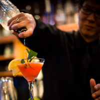 Bartender making drink at Kobe Japan Restaurant bar
